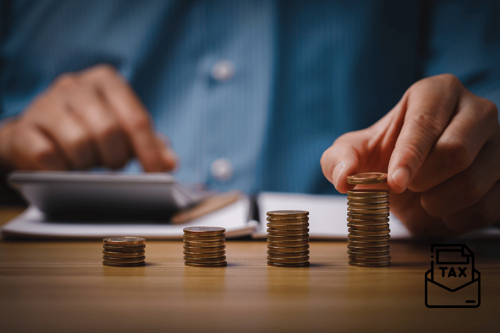 A business professional calculating corporate tax returns with stacked coins symbolizing financial growth and tax planning